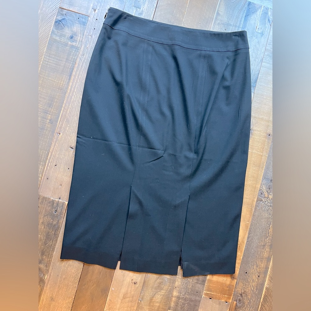Ann Taylor “Tall” slim, black, pencil skirt - hits below the knee.